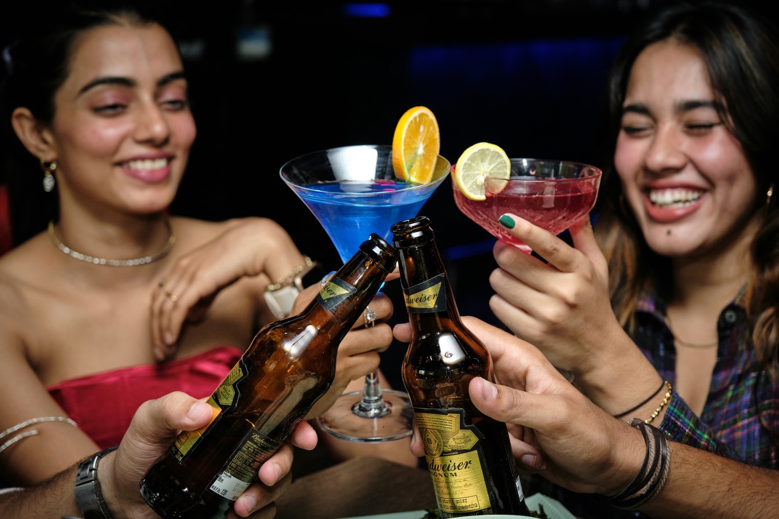 Friends enjoying drinks at a MIXERS event